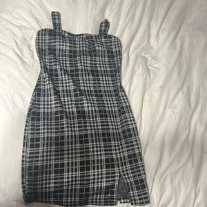 Black plaid dress with small slit on leg, worn once